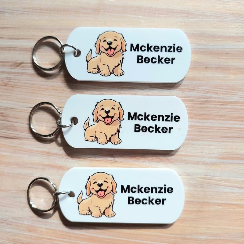 White Perspex bag tags with a puppy